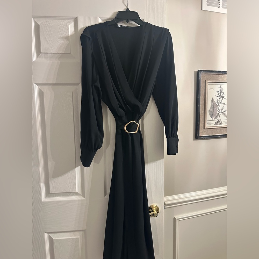 Elegant Black Dress with Gold Accent Belt front slit